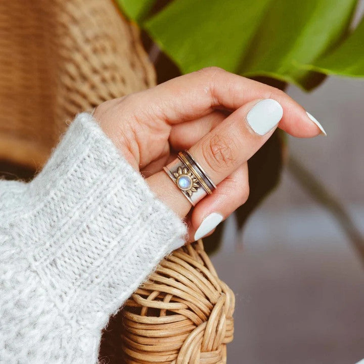 Dual-Tone Sun Moonstone Ring Featuring a Broad Silver and Gold Band