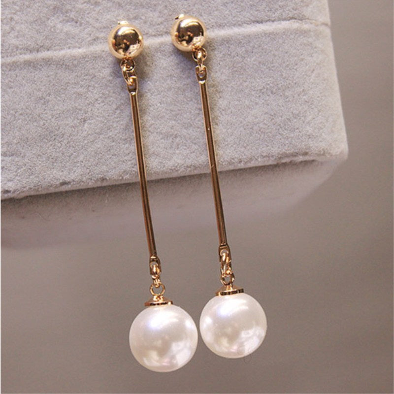 Elegant Drop Earrings Featuring Unique Handcrafted Pearls