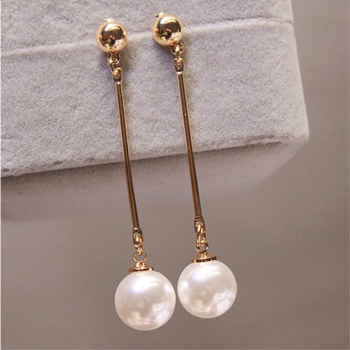 Elegant Drop Earrings Featuring Unique Handcrafted Pearls