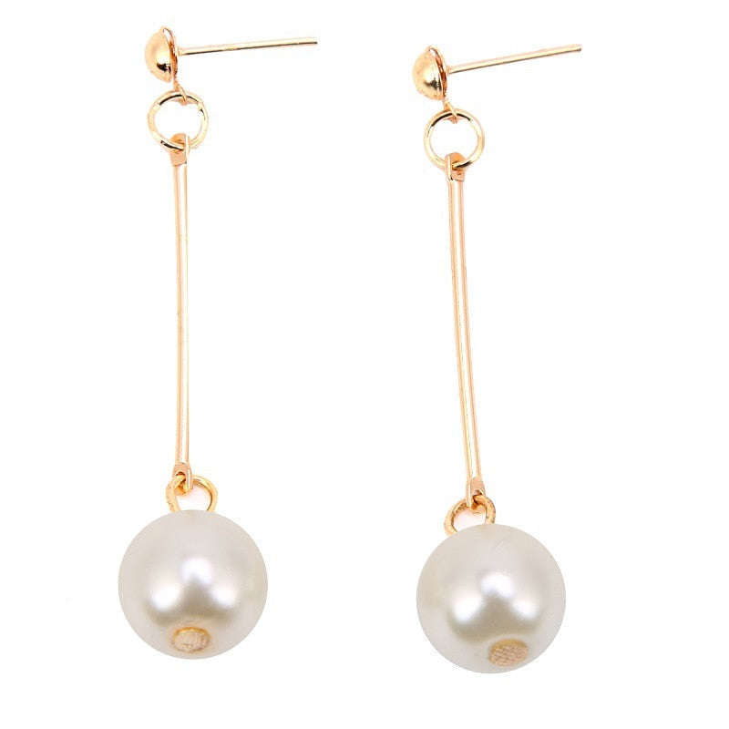 Elegant Drop Earrings Featuring Unique Handcrafted Pearls