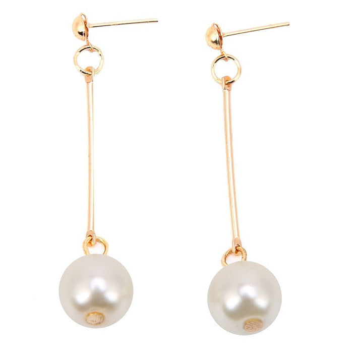 Elegant Drop Earrings Featuring Unique Handcrafted Pearls