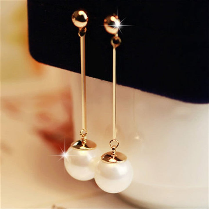 Elegant Drop Earrings Featuring Unique Handcrafted Pearls
