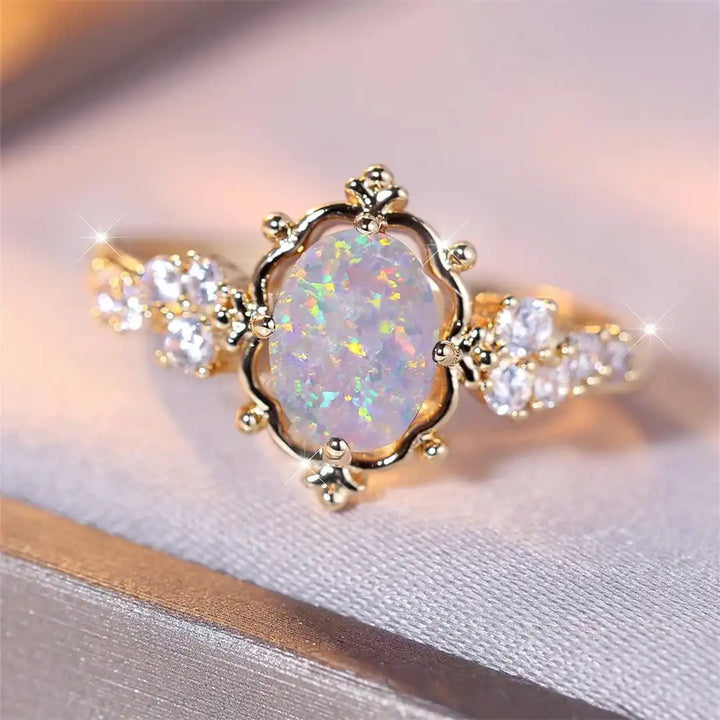 Oval Flower Ring with White Fire Opal Stone