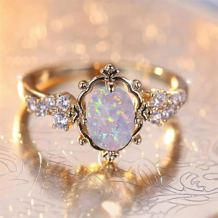 Oval Flower Ring with White Fire Opal Stone