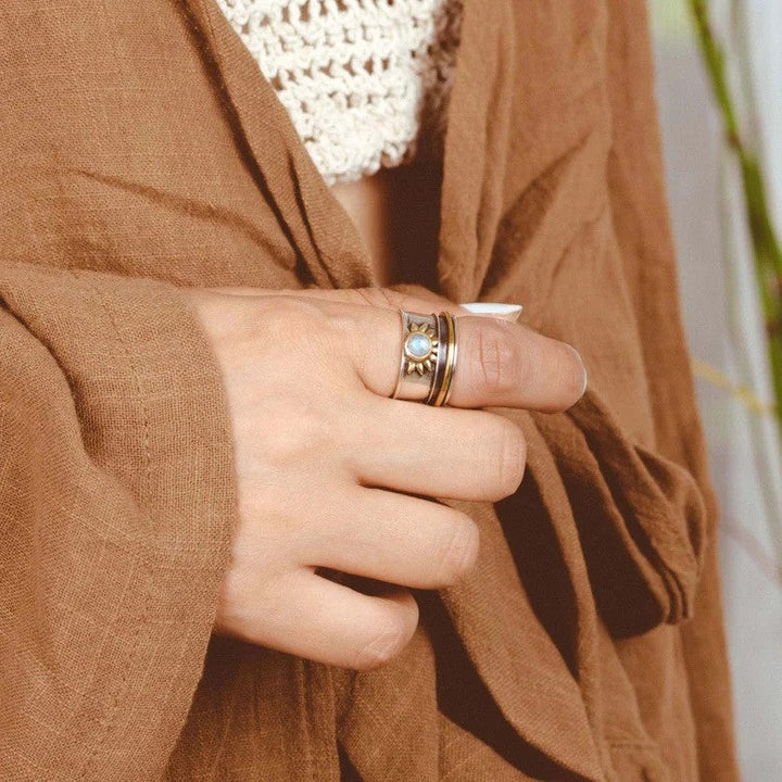 Dual-Tone Sun Moonstone Ring Featuring a Broad Silver and Gold Band