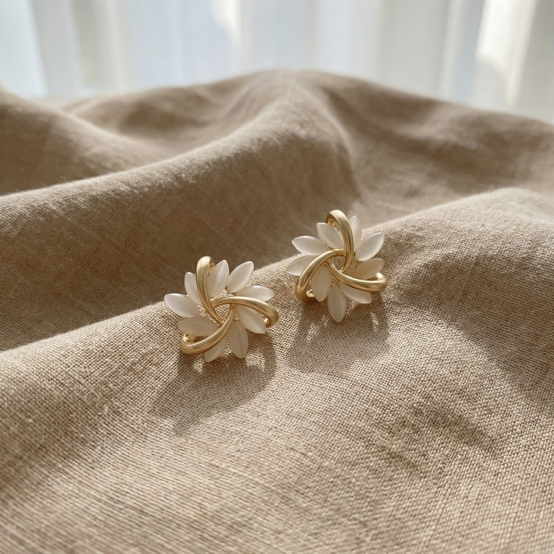 Elegant Gold Earrings with White Opal Accents