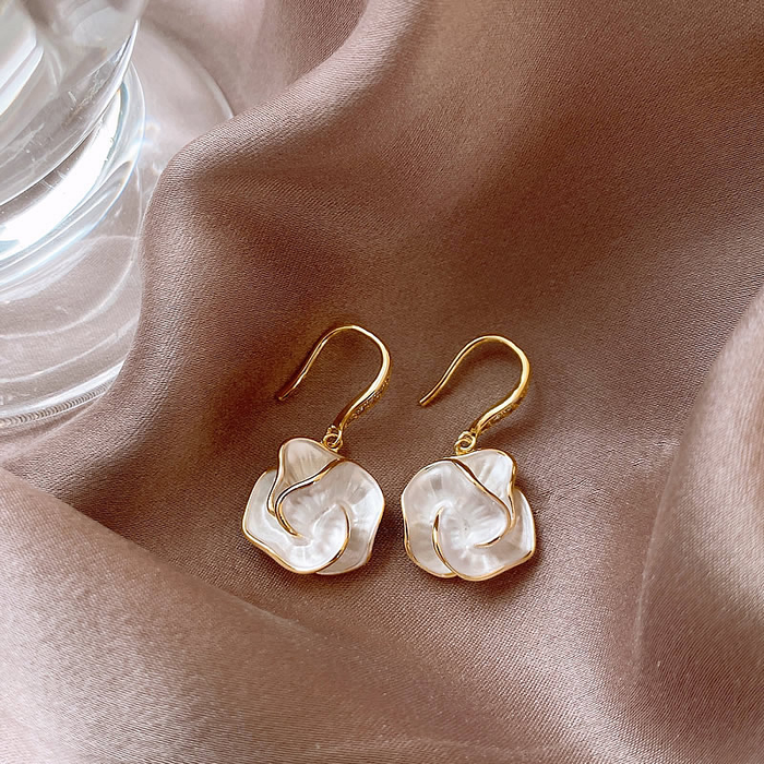 Chic Earrings Featuring White Floral Accents