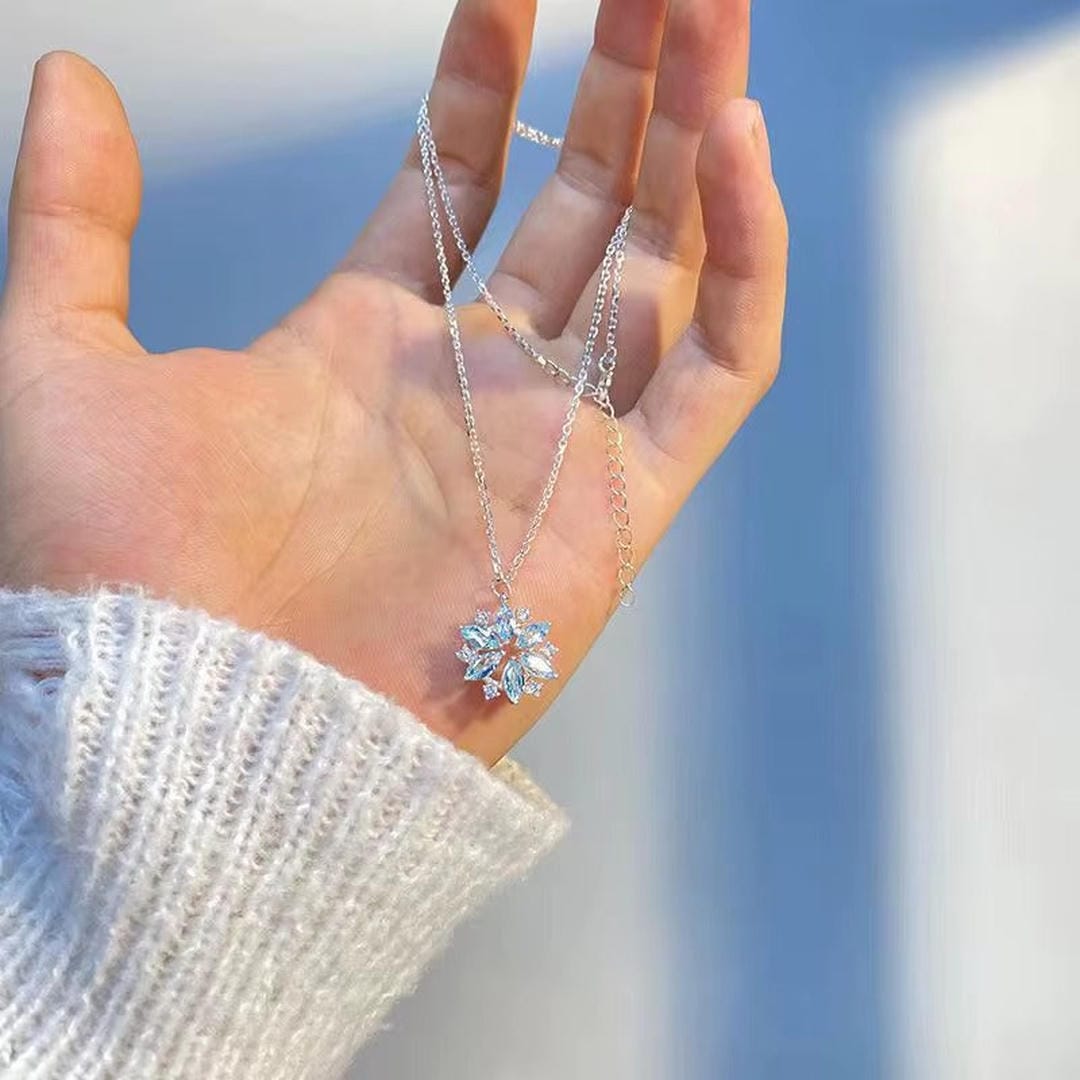White Gold Flower Pendant Necklace with Blue Snowflake Accent
