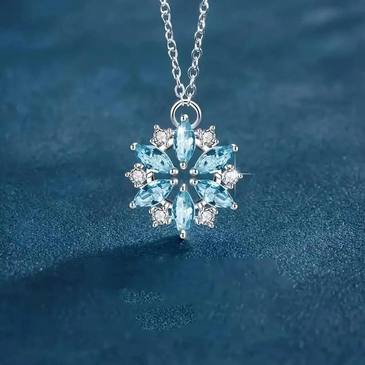 White Gold Flower Pendant Necklace with Blue Snowflake Accent