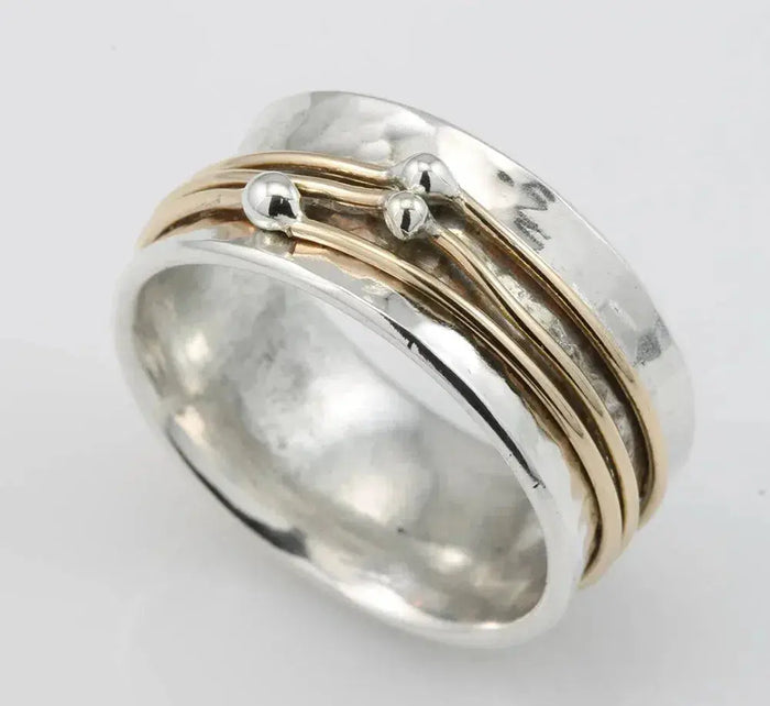 Antique-inspired layered silver ring with gold accents